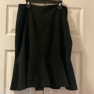INC black skirt with bottom ruffle and side zipper.